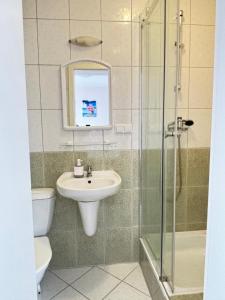 Kúpeľňa v ubytovaní Domino Dom Gościnny