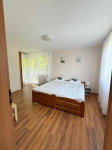 Posteľ alebo postele v izbe v ubytovaní Domino Dom Gościnny