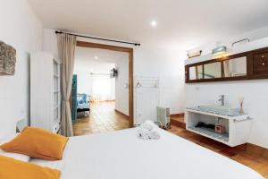 Posteľ alebo postele v izbe v ubytovaní Origens III - Rústico moderno apartamento