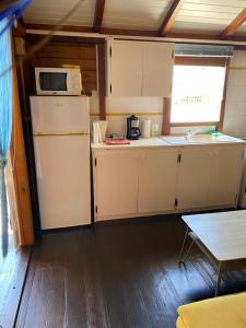 Kuchyň nebo kuchyňský kout v ubytování Chalet Paradis