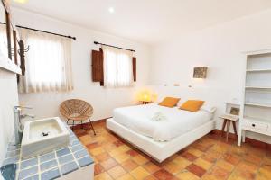 Posteľ alebo postele v izbe v ubytovaní Origens III - Rústico moderno apartamento