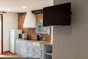 Kuchyňa alebo kuchynka v ubytovaní Origens III - Rústico moderno apartamento