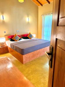 Postel nebo postele na pokoji v ubytování Art Yala Boutique Resort
