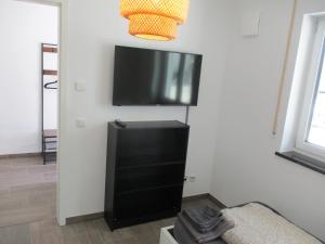 TV a/nebo společenská místnost v ubytování PARSBERGER STADTWOHNUNG 3