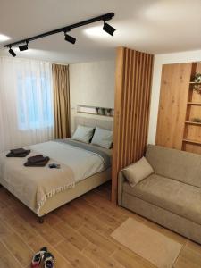 Postel nebo postele na pokoji v ubytování A2 Silver