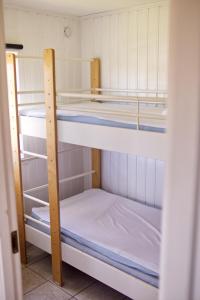 Postel nebo postele na pokoji v ubytování Hälleviks Camping