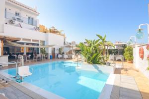 Bazén v ubytování Hostal La Ermita nebo v jeho okolí