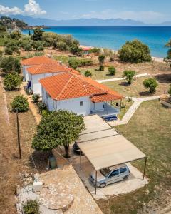 an overhead view of a house with a van parked in front at Villa Voula in Koroni