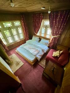 Ένα ή περισσότερα κρεβάτια σε δωμάτιο στο Singay Homestay