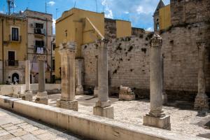 a group of columns in front of a building at Bari in un click in Bari