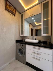Kuchyň nebo kuchyňský kout v ubytování Charmant appartement bien situé.