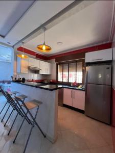 Kuchyň nebo kuchyňský kout v ubytování Charmant appartement bien situé.