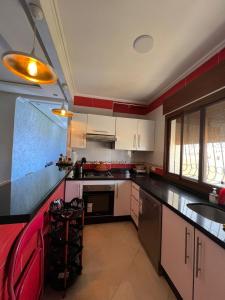 Cucina o angolo cottura di Charmant appartement bien situé.
