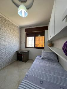 Letto o letti in una camera di Charmant appartement bien situé.