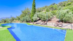 Bazén v ubytovaní Casa El Paraiso Montecorto by Ruralidays alebo v jeho blízkosti