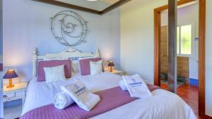 Posteľ alebo postele v izbe v ubytovaní Casa El Paraiso Montecorto by Ruralidays