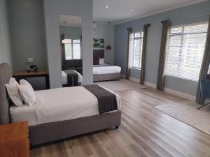 Postel nebo postele na pokoji v ubytování MyPond Stenden Hotel