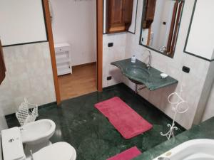Koupelna v ubytování Casa di Lu’