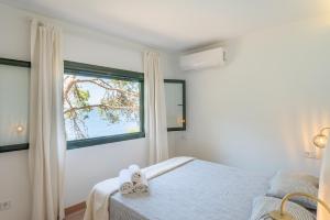 Кровать или кровати в номере Villa Banyalbufar
