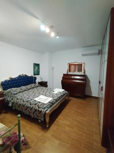Postel nebo postele na pokoji v ubytování Casa di Lu’