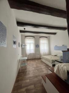 Postel nebo postele na pokoji v ubytování Apartmány v Podzámčí v blízkosti zámku Blatná