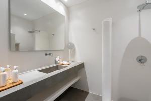 Vannituba majutusasutuses NĒRO Suites by NOMÉE Hospitality Group