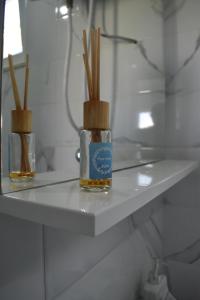 Et badeværelse på KenDar Family Apartments + 49 billeder