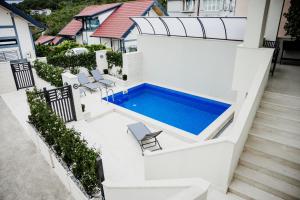 an image of a swimming pool on a house at Villa Perla in Tivat