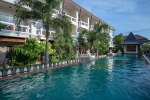 a swimming pool in front of a building at Neptune's Villa in Haad Rin +37 photos