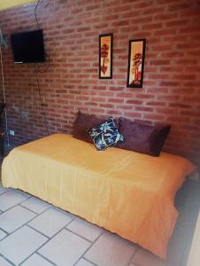 Postel nebo postele na pokoji v ubytování Cabañas mi Sueño