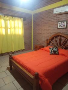 Postel nebo postele na pokoji v ubytování Cabañas mi Sueño