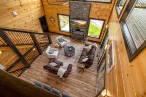 an overhead view of a living room in a cabin at Peace Giver by Eden Crest in Gatlinburg +45 photos