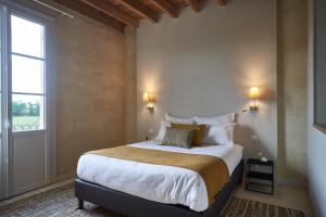 Llit o llits en una habitació de Château Bonalgue - Pomerol