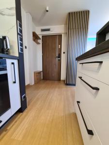 Kuchyň nebo kuchyňský kout v ubytování OffWysowa