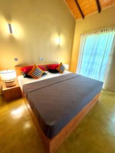 Postel nebo postele na pokoji v ubytování Art Yala Boutique Resort