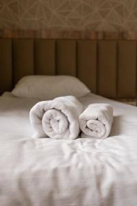 Postel nebo postele na pokoji v ubytování Glendale Boutique Hotel