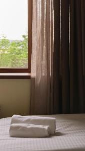Postel nebo postele na pokoji v ubytování Glendale Boutique Hotel