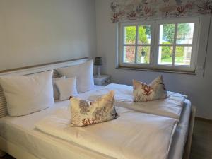 Postel nebo postele na pokoji v ubytování Fleesensee Resort & Spa