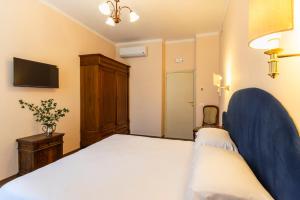 TV a/nebo společenská místnost v ubytování Boutique Hotel Heritage