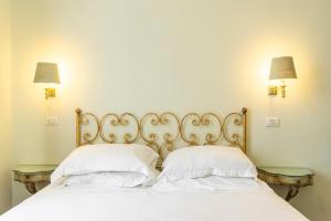 Postel nebo postele na pokoji v ubytování Boutique Hotel Heritage