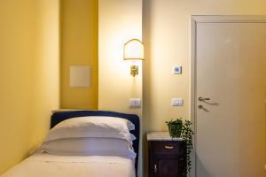 Postel nebo postele na pokoji v ubytování Boutique Hotel Heritage