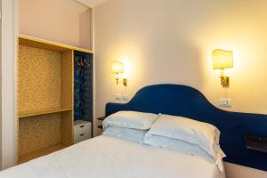 Postel nebo postele na pokoji v ubytování Boutique Hotel Heritage