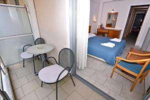 Aristotelis Hotel客房内的一张或多张床位