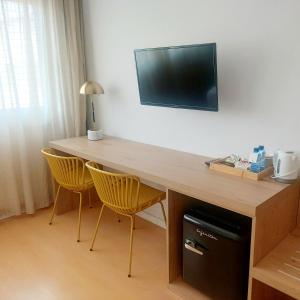 TV a/nebo společenská místnost v ubytování Daniya Alicante