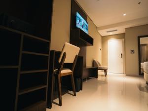 TV a/nebo společenská místnost v ubytování Zielo Hotel