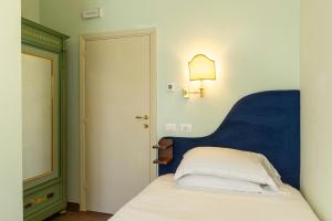 Postel nebo postele na pokoji v ubytování Boutique Hotel Heritage