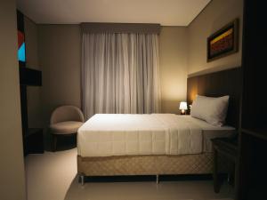 Zielo Hotel tesisinde bir odada yatak veya yataklar