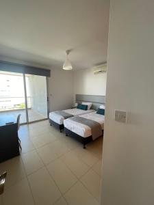 Fig Tree View Apartments 객실 침대