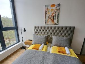 Cama o camas de una habitación en Apartman Yellow Moon