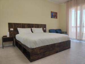 Postel nebo postele na pokoji v ubytování Urban Suite Milano